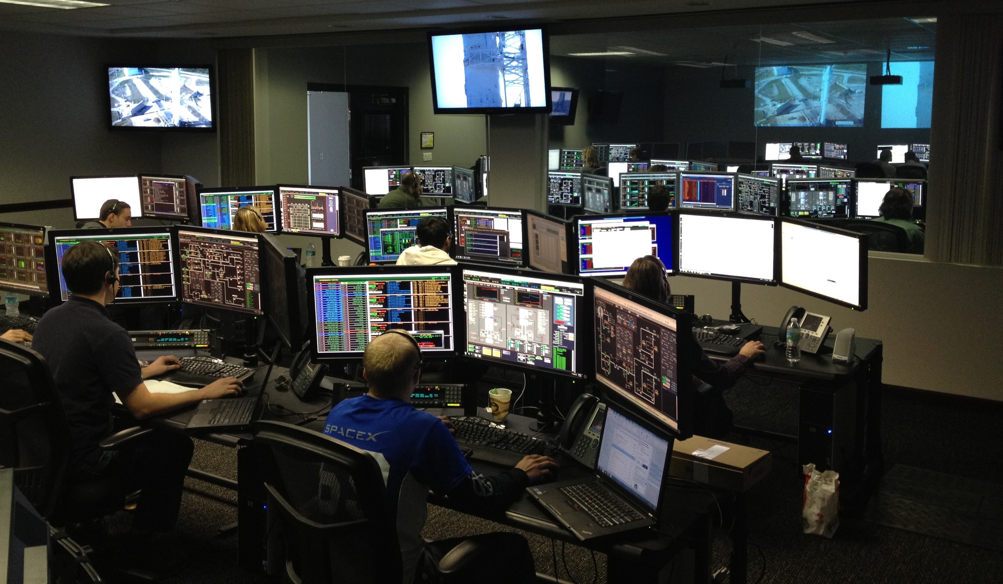 people working on digital computers